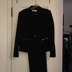 Black pants suit with silver accents